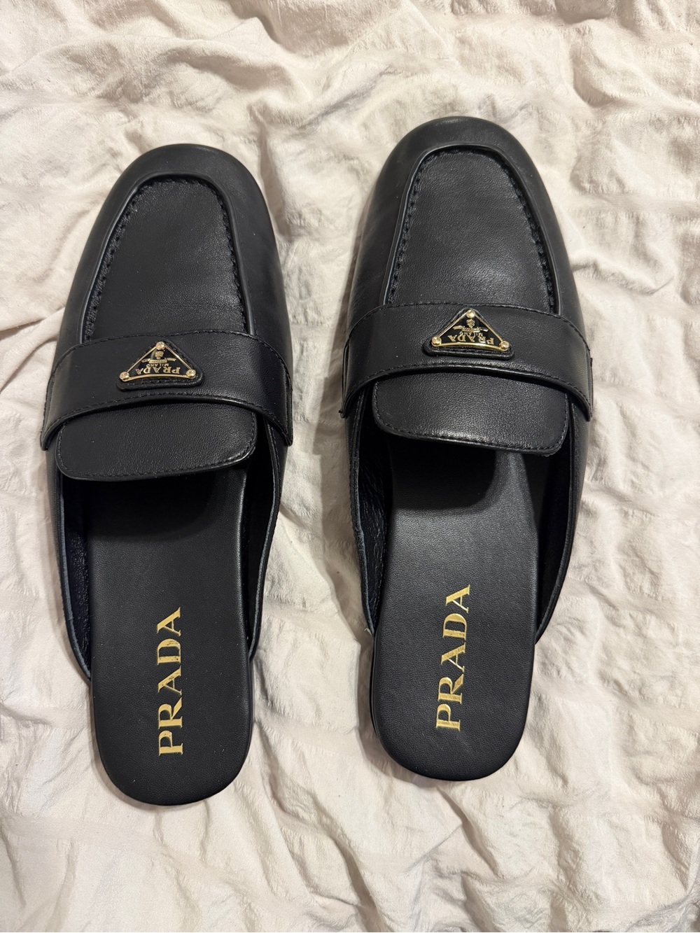 Like new Prada mules
